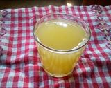 A picture of step 2 of Orange and ginger juice.