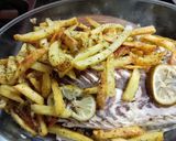 Foto del paso 2 de la receta: Merluza al natural con papas al horno