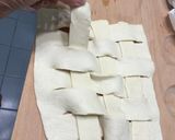 A picture of step 3 of Eggs And Coconut On SunDried Pesto Top Parmesan Puff Pizza.