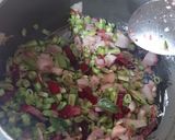 A picture of step 2 of Banglore style vegetable pulao (veg tomato bath) and mosru bajji.
