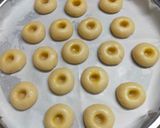 A picture of step 3 of Thumb Print Jam Cookies with White Butter.