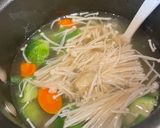 A picture of step 1 of Brussels Sprouts and Enoki Mushroom Soup.