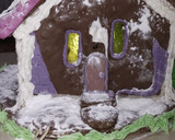 Foto del paso 5 de la receta: Mi casita de jengibre!! Con mucho chocolate,glasé y mucho color!!🧑‍🎄🧑‍🎄🎄🎄🎁🎇🎇