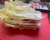A picture of step 2 of Japanese mille feuille hot pot with pork belly and napa cabbage.