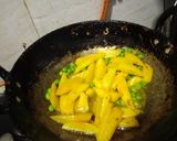 A picture of step 2 of Jeera aloo matar fry without onion garlic.
