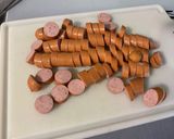 Une image de l'étape 5 de Gratin de langues d'oiseaux aux saucisses, champignons et emmental.