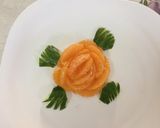 A picture of step 2 of Rose flower with orange slices.