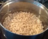 Foto del paso 4 de la receta: Patitas de cerdo con alubias (caraotas, judías) blancas