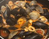A picture of step 4 of Frutos do Mar over Linguini.