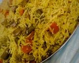 صورة لخطوة 4 من وصفة أرز بسمتي مع الفول والجزر