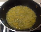 Foto del passaggio 3 della ricetta Tonno marinato, con cipolla caramellata all'arancia e cestino di spaghetti con finocchio e arancia