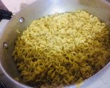 A picture of step 2 of Night hunger Egg Maggi masala.