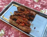 Une image de l'étape 9 de Saucisses de Toulouse grillées aux tomates,romarin et épices.