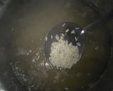 A picture of step 1 of Gur wale Chawal.