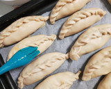 Foto del paso 7 de la receta: Empanadas rellenas con pollo horneado