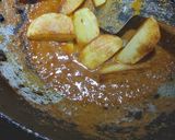 A picture of step 4 of Rui Aloo Mache Jhal.