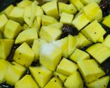 A picture of step 2 of Raw mango vaghariyu.