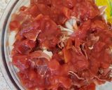 A picture of step 4 of Layered Chicken, mushroom and Parma ham bake 😀.