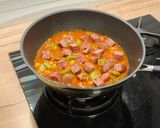 Foto del paso 6 de la receta: Wok de magro de cerdo entomatado con garbanzos y judías verdes