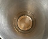A picture of step 2 of Orange Martini Cocktail.