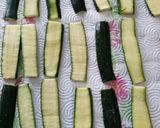 A picture of step 1 of Insalata di zucchine alla griglia grilled courgette salad.