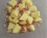 A picture of step 5 of Meethi Alo.