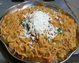 A picture of step 3 of Cheese Maggi.