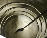 A picture of step 1 of Powder milk yogurt.