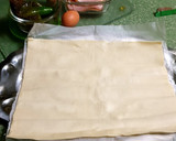 Foto del paso 2 de la receta: Hojaldre de bacon pimientos y queso