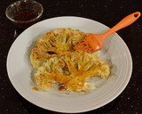 A picture of step 5 of Spicy Grilled Cauliflower with Sriracha Hollindaise Sauce.