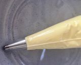A picture of step 3 of Rum Glazed Almond & Raisin Filo Roll with Rum Cream.
