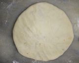 A picture of step 14 of Aloo walay nan.