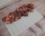 Foto del paso 7 de la receta: Canelones de pisto con bacalao gratinados con lactonesa de mostaza con miel