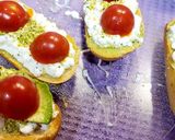 A picture of step 4 of Toasts with Cottage Cheese, Cherry Tomatoes, Guacamole, and More.