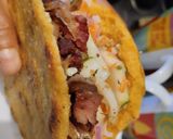 Foto del paso 10 de la receta: Arepa🥯rellena de pollo🫕y salchichón teriyaky con ensalada fresca🥙🧆🌯
