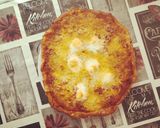 Foto del paso 2 de la receta Pizza con salsa napolitana bacon, jamón dulce y huevos de codorniz