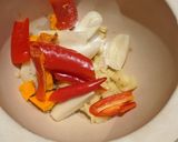 A picture of step 4 of Fish curry with coconut + turmeric.