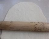 A picture of step 8 of Cardamon Mandazi.