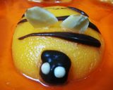 A picture of step 15 of Honey Bee Orange Jello dessert.