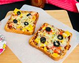A picture of step 6 of Bread Pizza.