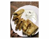 A picture of step 4 of Crepés and ice cream.
