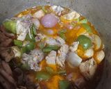 A picture of step 3 of Makhni chicken (handi).