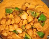 A picture of step 14 of Soya Chunks Capsicum & Onion Curry soyabeena badi ki sabji.