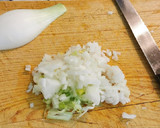 Foto del paso 5 de la receta: Calamar relleno de sus tentáculos, aletas y Cigala