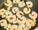 A picture of step 4 of Greek salad with shrimps.
