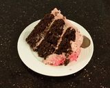 A picture of step 21 of Dark Chocolate Layer Cake with Fresh Strawberry Cream Frosting and Filling.