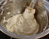A picture of step 10 of White Chocolate Truffle Cupcakes with Whipped White Chocolate Mascarpone Frosting.