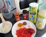 Une image de l'étape 1 de Riz jaune + poulet à la sauce tomate.