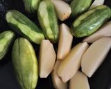A picture of step 1 of Chal potol(parwal/pointed gourd).