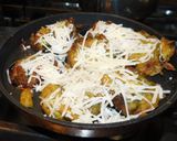 A picture of step 4 of Spicy cheesy healthy kuzhi appam with left over idli batter.